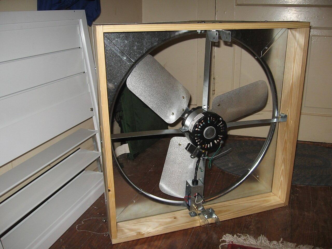 Photo of a whole-house fan and its shutters, prior to installation.