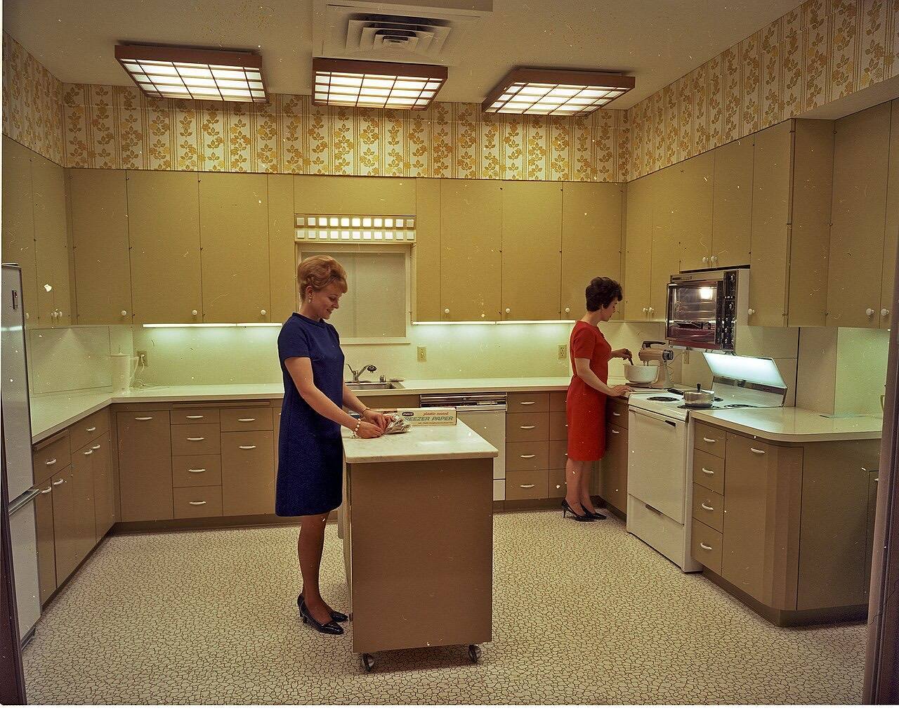 Home economists in kitchen, Seattle, Washington, USA, 1968. At left in the blue dress is City Light Home Economist Mary Norris, who died July 12, 2012.